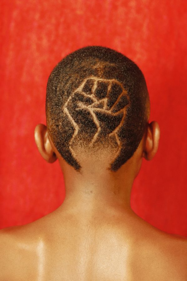 The art of protest is not limited to taking actions to the street. In a time of world divide, I chose art to speak out against injustices facing the Black community. Photography and haircut by Henry R. Jones II.